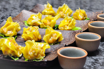 Dim sum Dim sum is usually linked with the older tradition from yum cha.