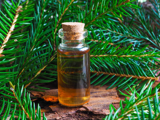 Natural fir oil in a mini bottle.
