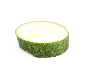 Green zucchini slice isolated