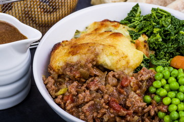 Shepherd’s Pie Dinner
Shepherds Pie topped with Colcannon potato, with a selection of fresh vegetables and Irish Stout battered onion rings and Sourdough Flat Bread.