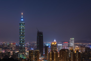Fototapeta na wymiar View of Taipei 101 building at night with city lights