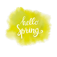 Naklejka na ściany i meble calligraphic inscription on green and yellow watercolor background hello spring