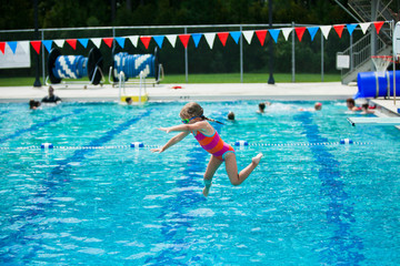 Little Girl Swim Lessons off Diving Board