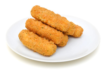 Mozzarella cheese sticks on white plate on white background