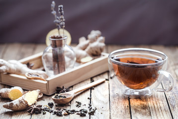 still life with a cup of tea on a wooden background