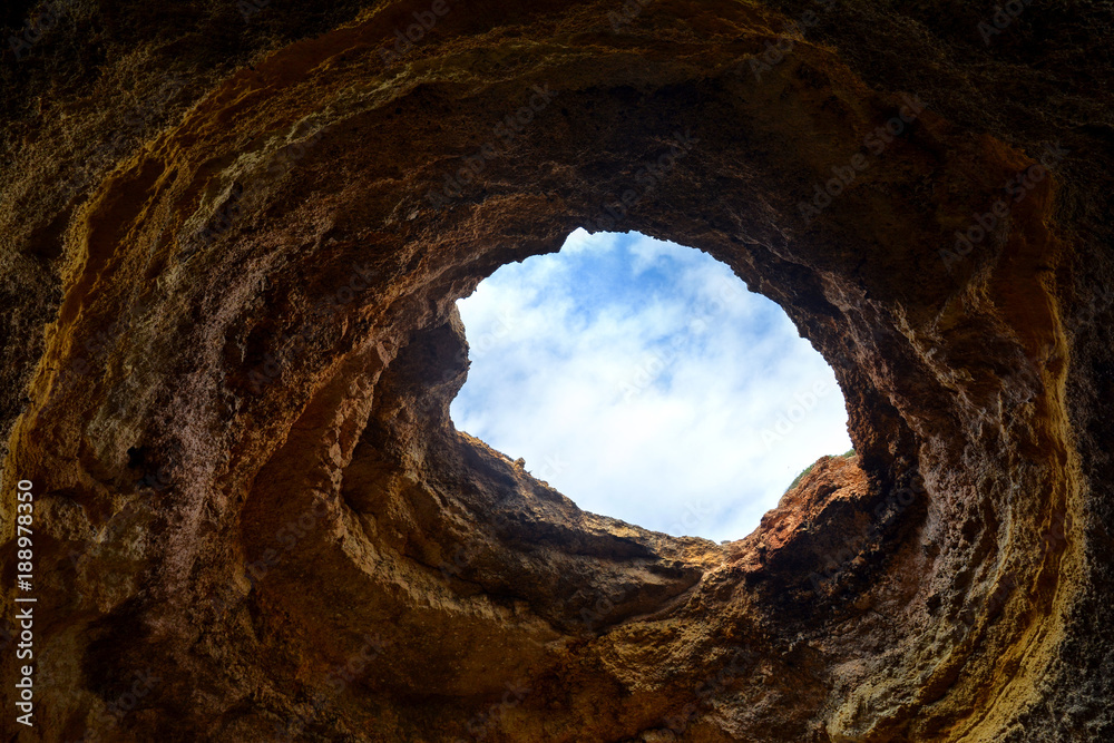 Canvas Prints The interior of a sea cave on the Algarve coast near Benagil, Portugal, Europe. Nature geology seen from boat trip.