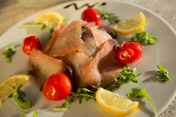 Smoked tuna, served on plate, Croatia restaurant.