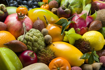 Fresh Thai tropical fruits heap, healthy food, diet nutrition, selective focus 