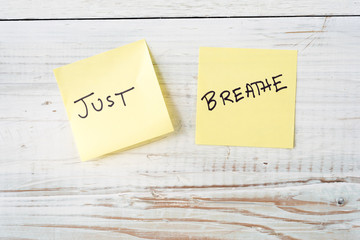 Two Post It Notes with Message Just Breathe