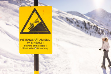 a warning sign in the mountains