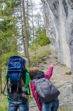 Family hike along the the rocky hill