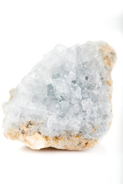 Raw light blue celestine on white background