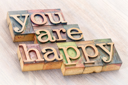 You are happy word abstract in wood type