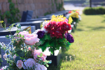 Fake flowers on grave
