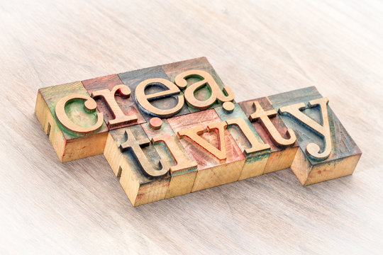creativity word abstract in wood type