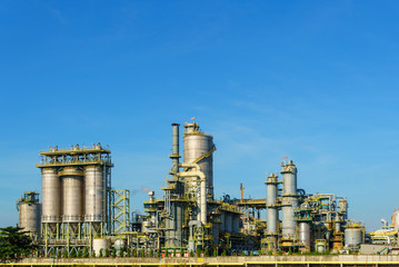 Oil refineries and petrochemical plants with blue sky background. with copy space for your text message