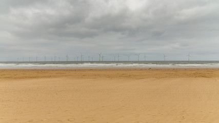 Coatham Beach near Redcar and Wind turbines at the North Sea Coast, Redcar and Cleveland, UK