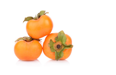  fresh ripe persimmons isolated on white background