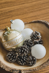 Christmas concept with Christmas decorations on wood background.