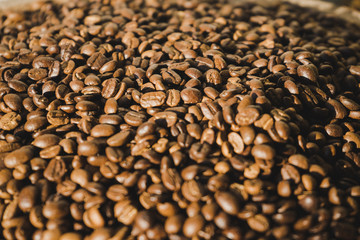 Roasted coffee beans background.