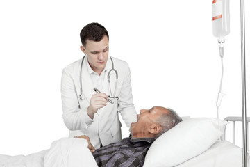 American doctor examining throat of his patient