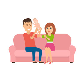Obraz premium young family.father and mother holding baby sitting on the sofa