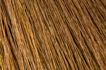 Broom on wooden floor
