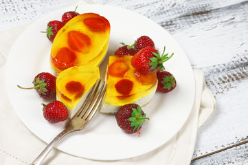 Fruity cake with jelly and strawberries