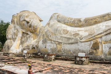 Fototapeta premium Reclining Buddha at Wat Lokayasutharam Temple in Ayuthaya Historical Park, a UNESCO world heritage site, Thailand