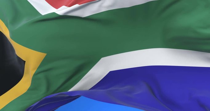 Flag of South Africa waving at wind in slow in blue sky, loop