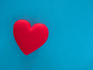red heart valentine on blue background