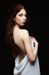 Fototapeta premium Portrait of attractive young woman on black background