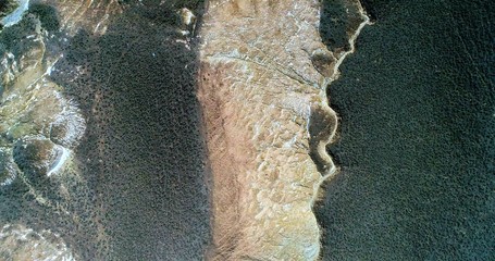 Rainbow mountains - amazing pattern created by nature. Aerial view on colorful sandstone hills...