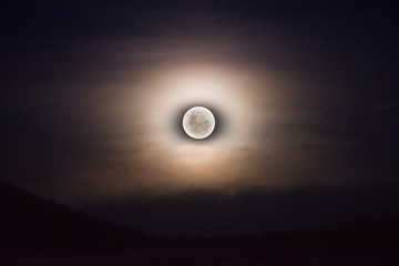 Super moon with illuminated sky at night