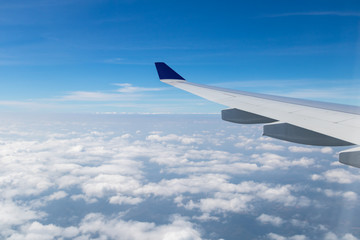 Naklejka na ściany i meble Sky and clouds view from airplan window