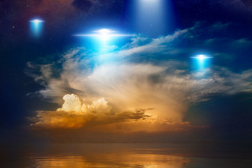 Extraterrestrial aliens spaceships, ufo in red glowing sky