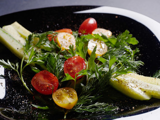 Salad of cucumbers and tomato