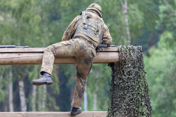 a german soldier trained on assault course