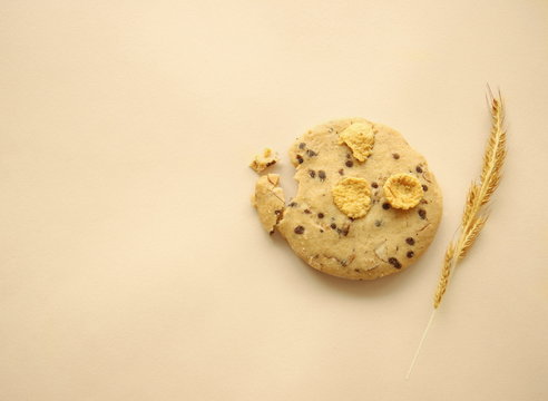 grain cookie bakery with nature wheat on beige background