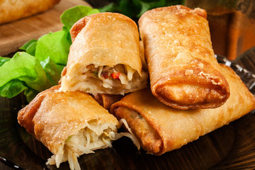 Spring rolls with chicken and vegetables served with sweet chili sauce or soy sauce