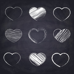 Chalk drawn heart. Geometric figures on chalkboard background.