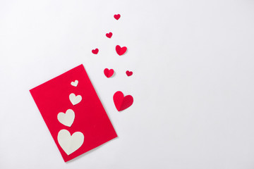 Fototapeta na wymiar Valentine card with red heart and ribbon