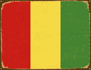 Vintage Metal Sign - Guinea Flag - Vector EPS10. Grunge scratches and stain effects can be easily removed for a cleaner look.
