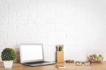 Creative designer desktop with blank computer