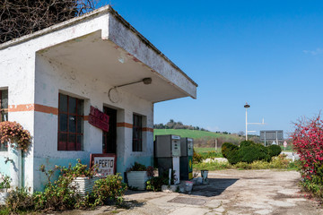 Fototapeta na wymiar Old gas station. Marche region, Italy