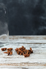 dry star anise on wooden table