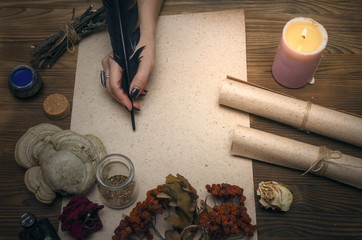 Ancient magic scroll paper sheet with copy space. Witchcraft. Witch doctor desk table. Magic...