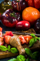 Ingredients for making fresh healthy tomatoes salad