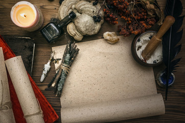 Ancient magic scroll paper sheet with copy space. Witchcraft. Witch doctor desk table. Magic...