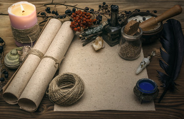 Ancient magic scroll paper sheet with copy space. Witchcraft. Witch doctor desk table. Magic potion. Alternative medicine concept.